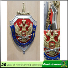 Emblema de forma de escudo personalizado con espada